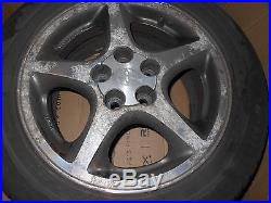 4 toyota celica coupe alloy wheels, tyres and bolts, center caps, locking nuts