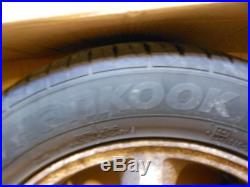 4 toyota celica coupe alloy wheels tyres and bolts, center caps, locking nuts ng8