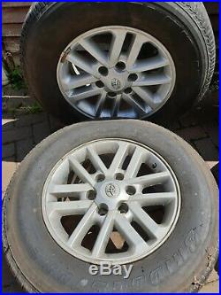 4 toyota hilux 17 original wheels with tyres, original nuts and locking nuts