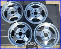 4 x Triumph Stag Alloy Wheels 14 including chrome / locking nuts