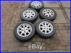 Classic Mini Cooper Alloys Wheels with caps and new nuts, locking nuts, set of 5