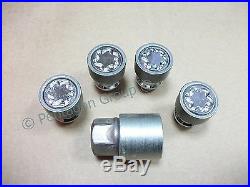 New Genuine Nissan X-Trail / Juke Set Of 4 Locking Wheel Nuts/Bolts KE40989951